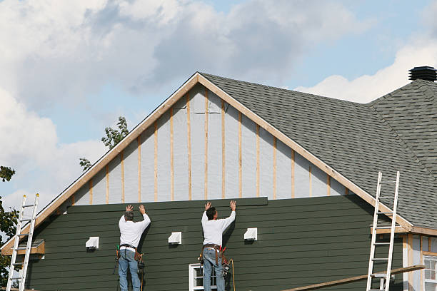 Professional Siding Contractor technician working in Elrama, PA
